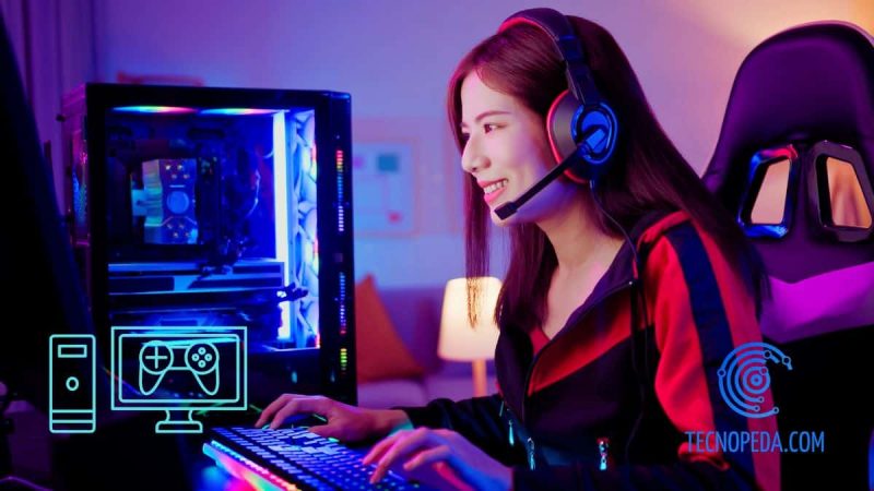 Mujer asiática en un set gaming jugando con el pc